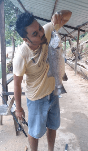 Saran with his Barramundi at the Serdang Pond