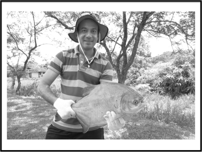 Anupam proudly holding up his Pacu